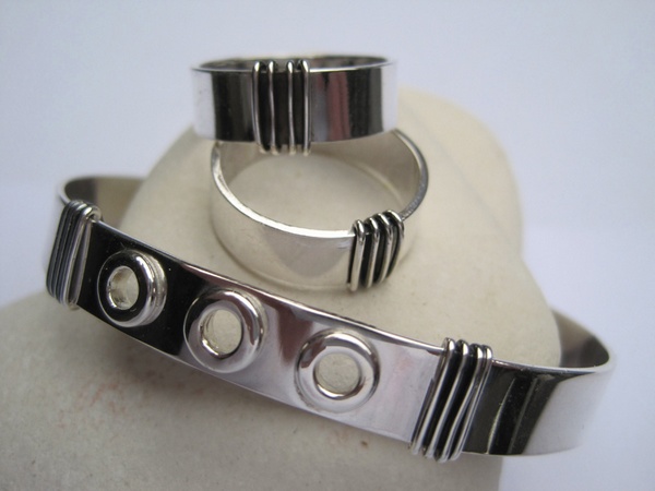 Silver bangle and rings bound with fine oxidised silver wire and ring detail